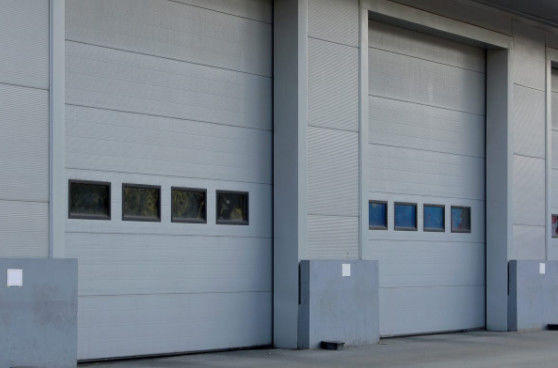 アルミニウムは部門別のドアの現代保証厚さ2.0mmの住宅のガレージおよび絶縁された部門別のドアを絶縁した