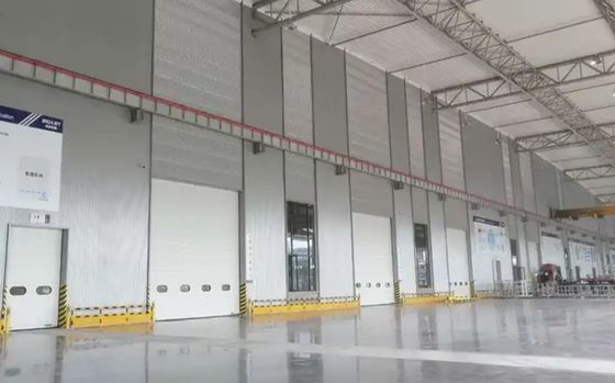 消防署自動ヘビーデューティ産業用オーバーヘッドリフティングドア | PUパネルセクショナルオーバーヘッドドア、耐候性設計および産業用セクショナルドア