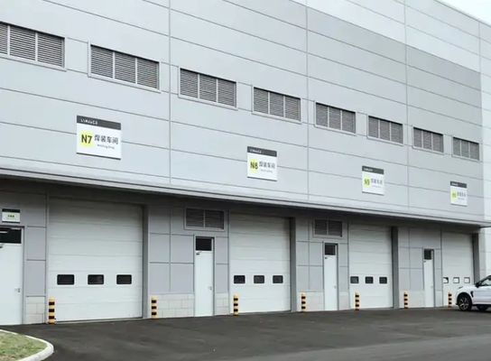 消防署自動ヘビーデューティ産業用オーバーヘッドリフティングドア | PUパネルセクショナルオーバーヘッドドア、耐候性設計および産業用セクショナルドア
