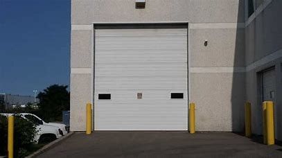 アルミ合金の縦の自動滑走の倉庫の頭上式の産業ドア